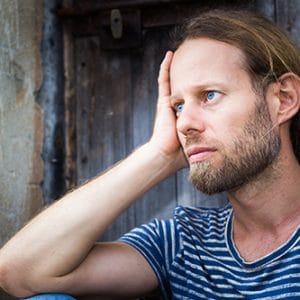 Sad blue eyed guy ready to battle opiate addiction.