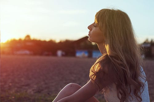 To define detox this woman meditating in the sunset agrees to treatment